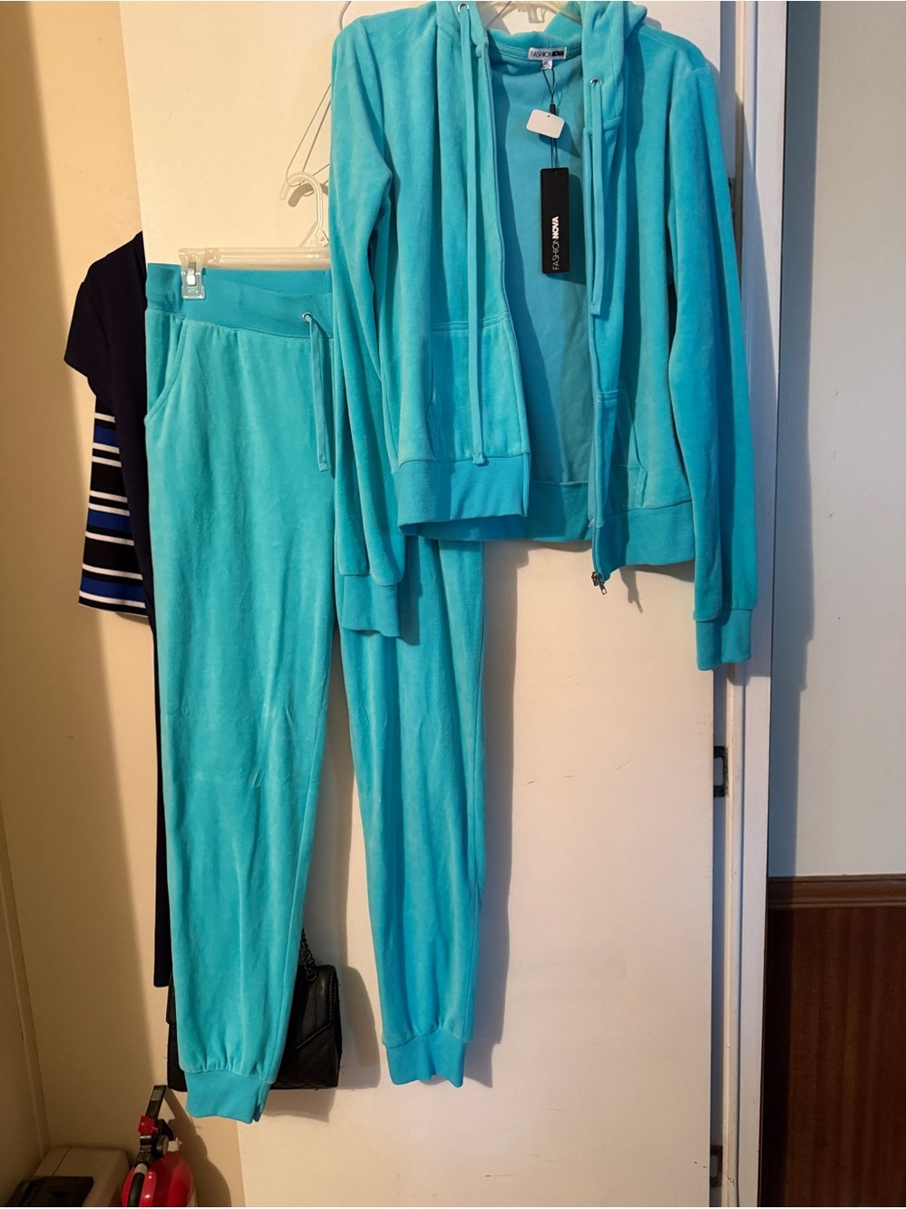 Womens Fashion Nova suit Baby Blue Size XL has Baby Girl on the back brand new